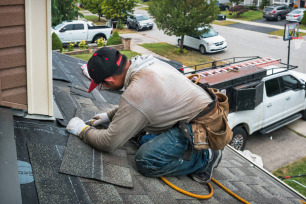 Professional Emergency Roof Repair technician working in Brick, NJ
